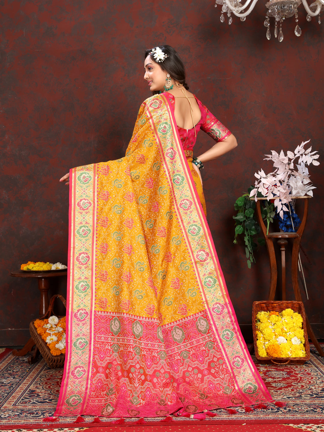 Stunning Mustard-Yellow Patola Silk Saree with elegant meenakari motifs and a perfectly crafted designer blouse.