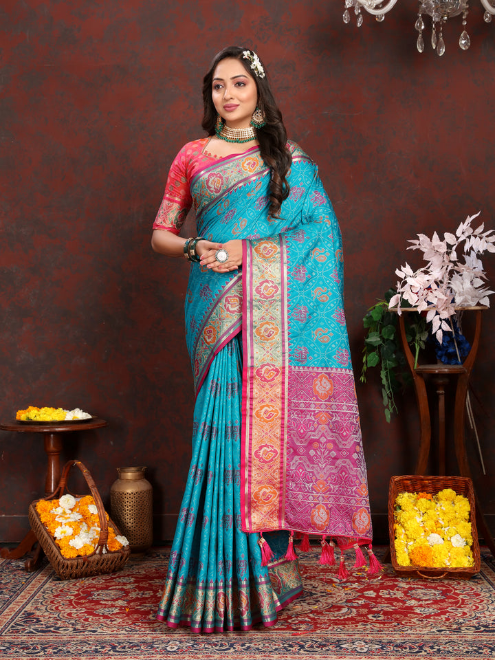 Elegant Sea-Blue Patola Silk Saree with exquisite meenakari motifs and a designer blouse for weddings.