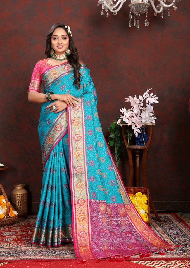 Stunning Sea-Blue Soft Patola Silk Saree with intricate meenakari work and a perfectly designed blouse.