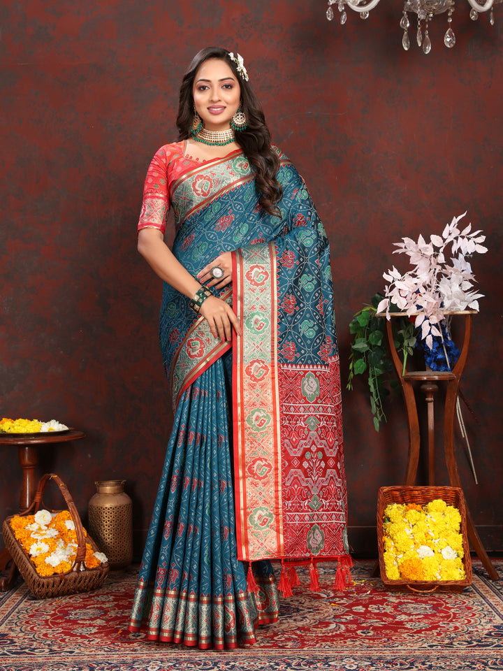 Stunning Sea-Blue Soft Patola Silk Saree with delicate meenakari work and a designer blouse for weddings.