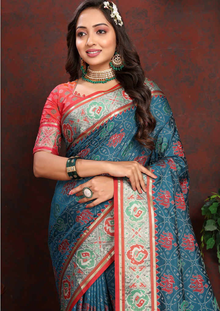 Beautiful Deep-Sea-Blue Soft Patola Silk Saree with intricate meenakari work and designer blouse for festive occasions.