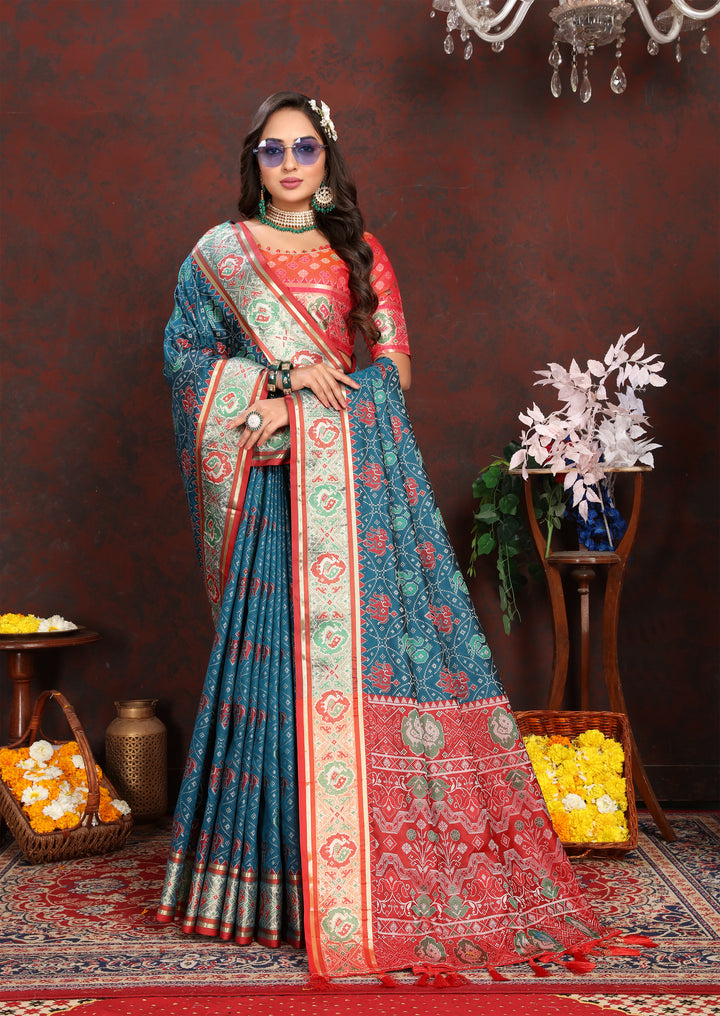 Radiant Deep-Sea-Blue Patola Silk Saree with rich meenakari motifs and designer blouse for bridal wear.