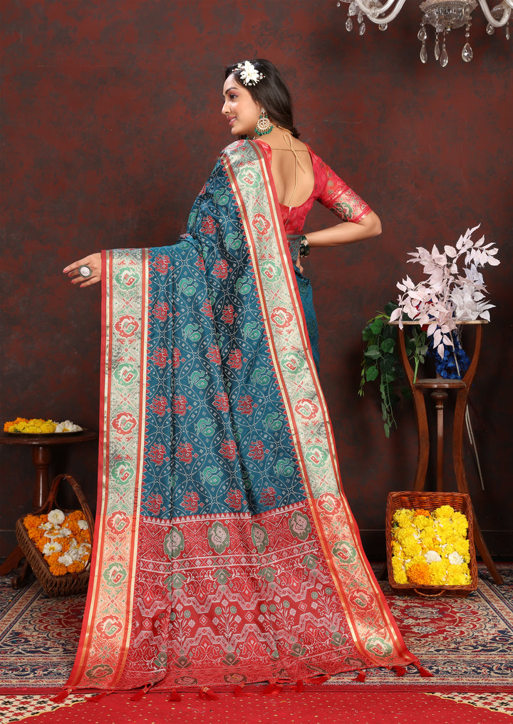 Stunning Deep-Sea-Blue Soft Patola Silk Saree with exquisite meenakari details and a luxurious designer blouse.