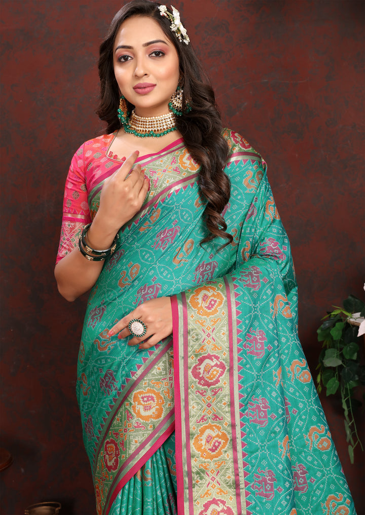 Stunning Sea-Green Soft Patola Silk Saree with intricate meenakari work and designer blouse for weddings.