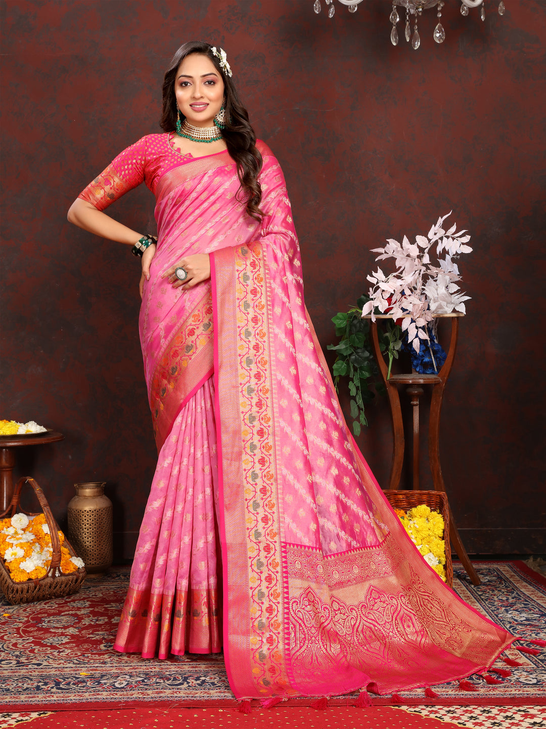 Timeless pink soft organza saree with intricate detailing, complemented by a matching blouse piece, ideal for cultural events.