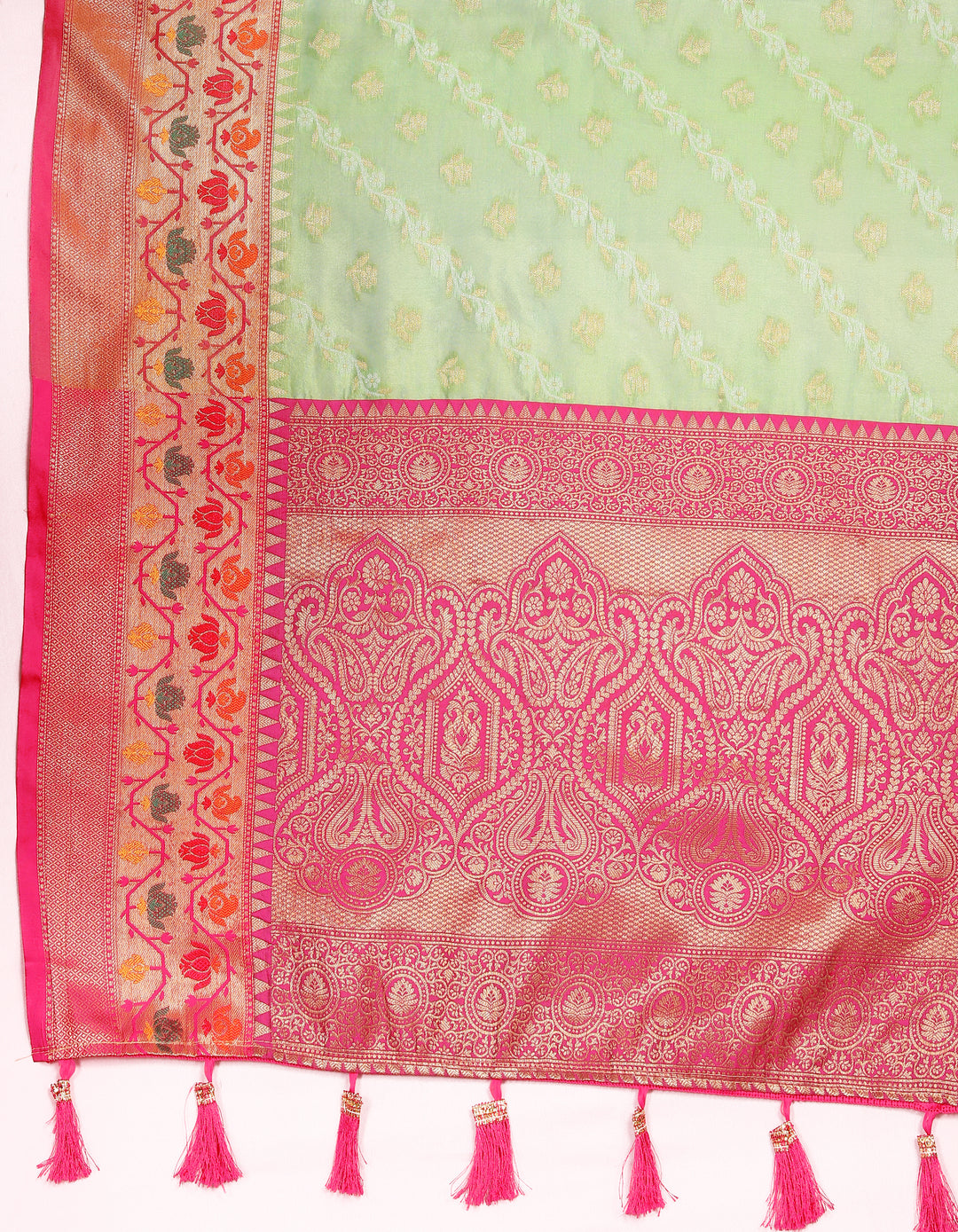 Graceful pista green organza saree with exquisite embroidery and matching blouse piece, ideal for elegant gatherings.