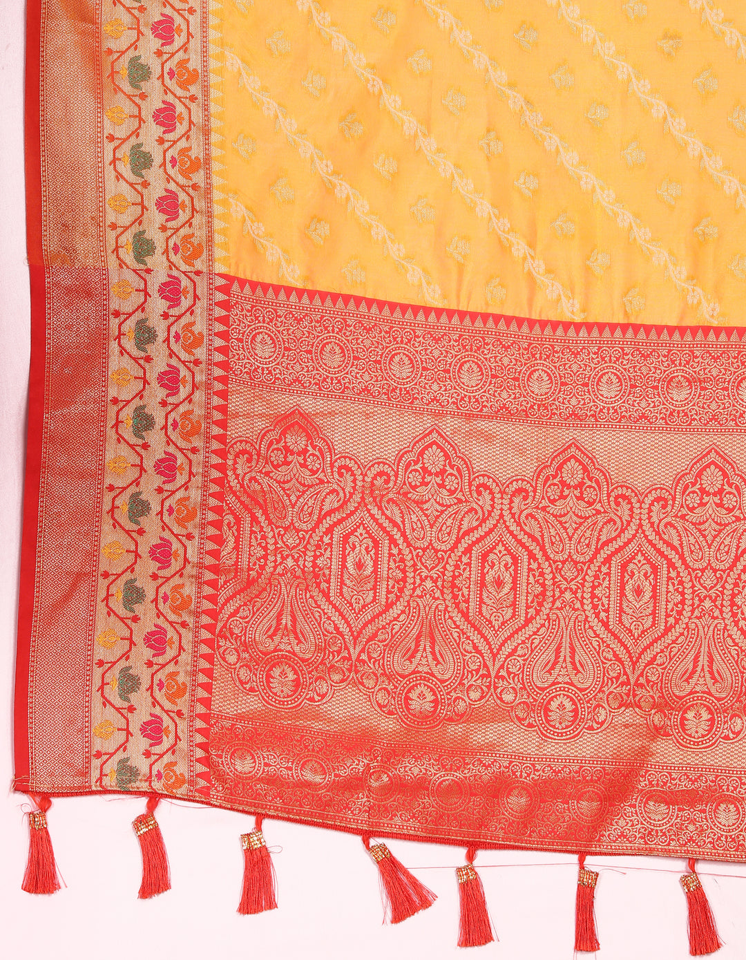 Elegant yellow organza saree with delicate embroidery and matching blouse piece, ideal for traditional celebrations.