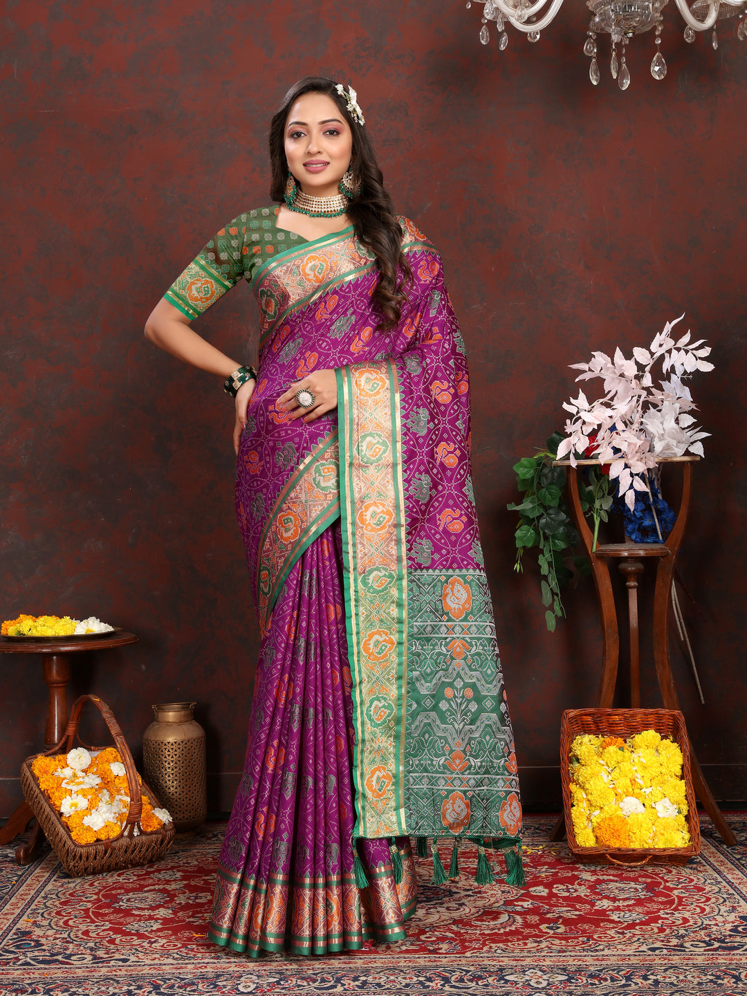 Radiant Sea-Green Patola Silk Saree with meenakari motifs and designer blouse for bridal wear.