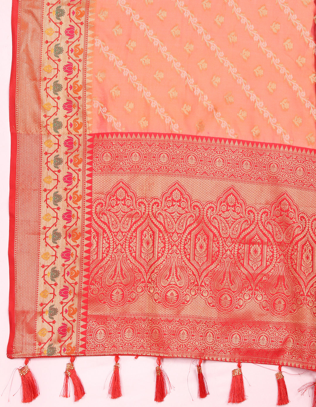 Classic orange saree in soft organza with exquisite patterns and a matching blouse piece, perfect for elegant events.