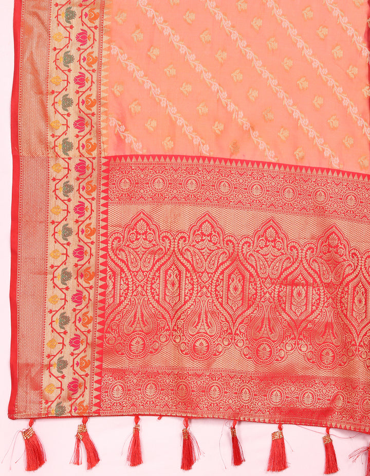 Classic orange saree in soft organza with exquisite patterns and a matching blouse piece, perfect for elegant events.