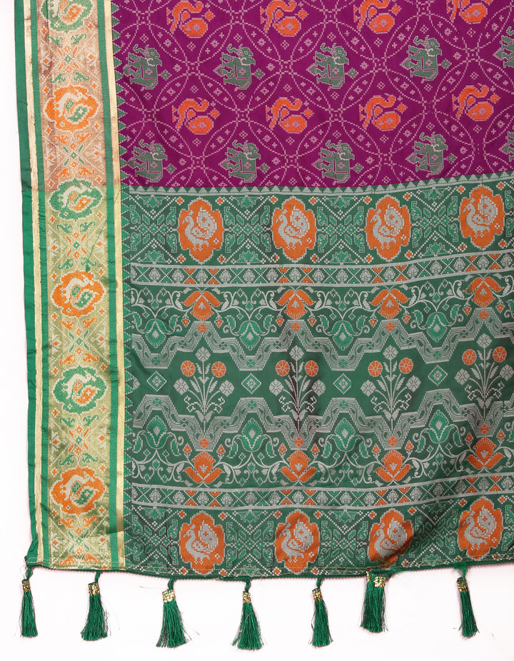 Premium Purple Patola Silk Saree with exquisite meenakari motifs and a perfectly designed designer blouse.