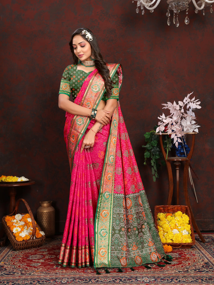 Gorgeous Pink Soft Patola Silk Saree featuring intricate meenakari work and a stylish designer blouse.