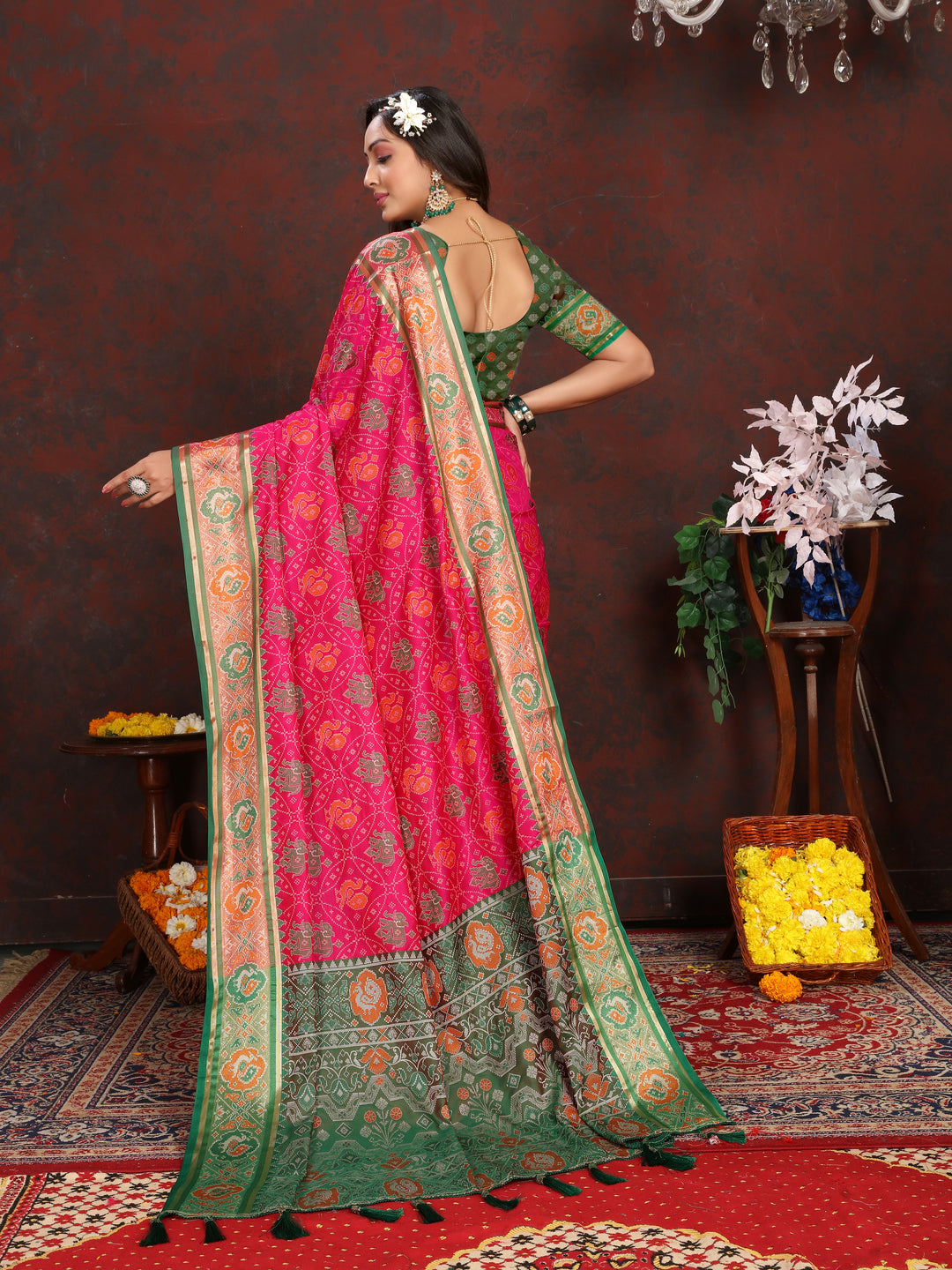 Elegant Pink Patola Silk Saree with detailed meenakari motifs and a designer blouse for weddings.