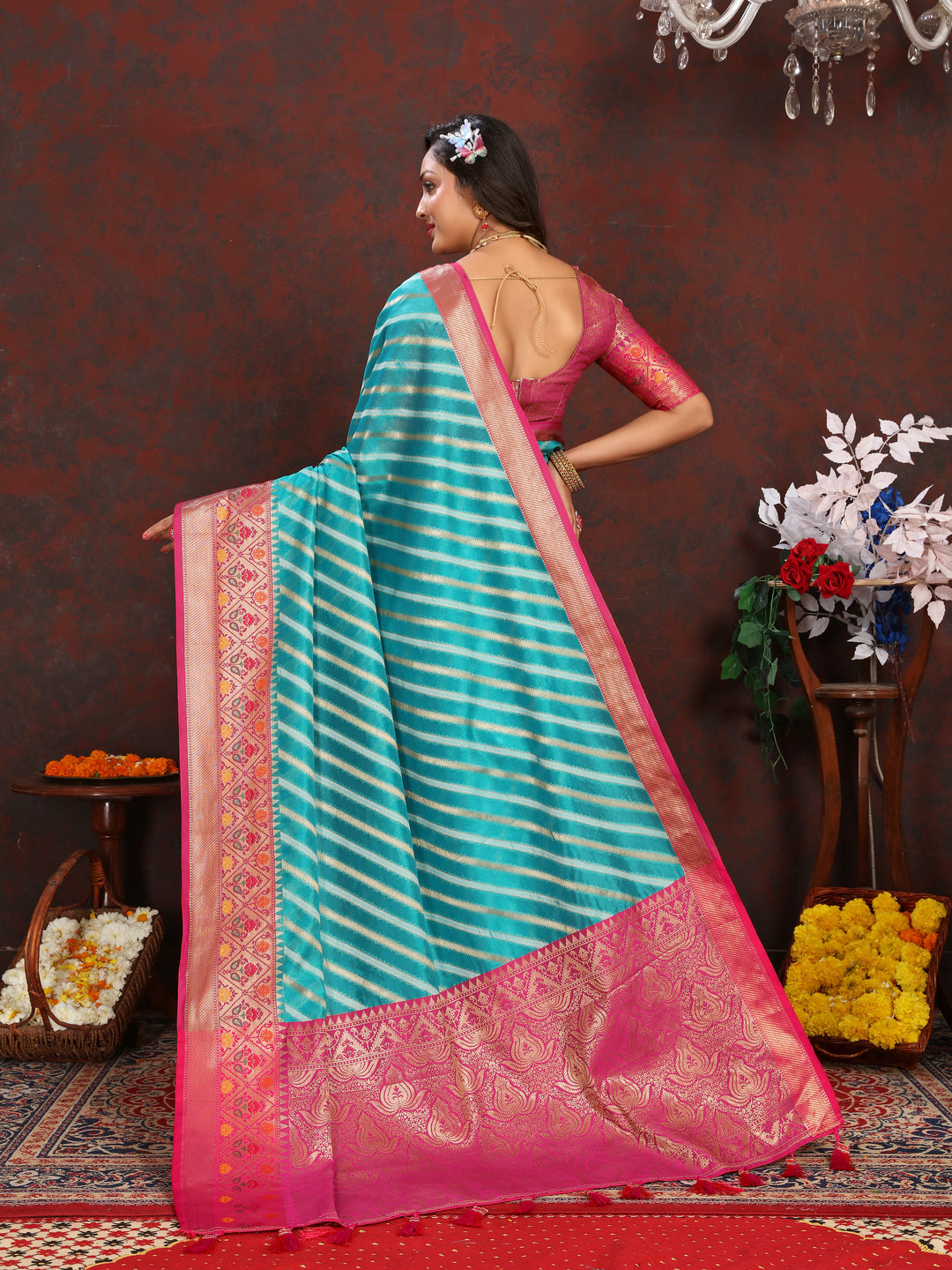 Beautiful Sea-Blue Soft Organza Saadi with detailed work and luxurious patterns for festive celebrations.