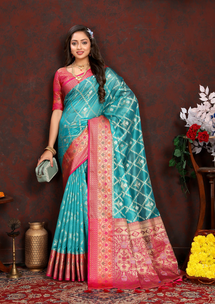 Designer sky blue Organza silk sari with rich detail, perfect for cultural celebrations.