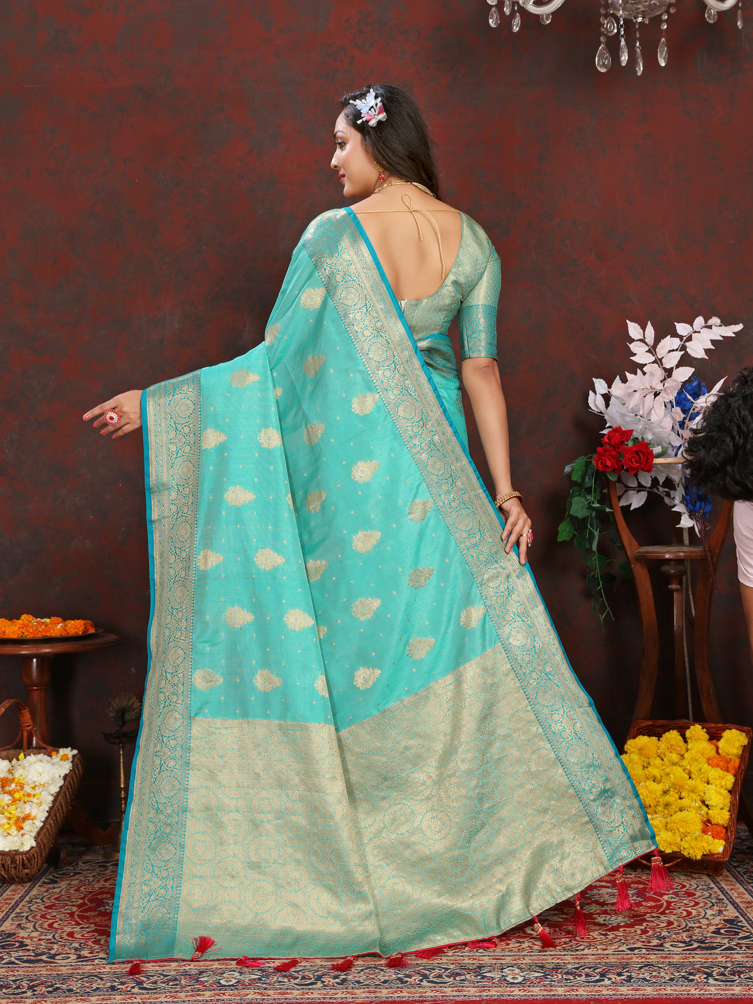 Vibrant sea blue soft Katan silk saree with exquisite zari weaving on the pallu for special events.