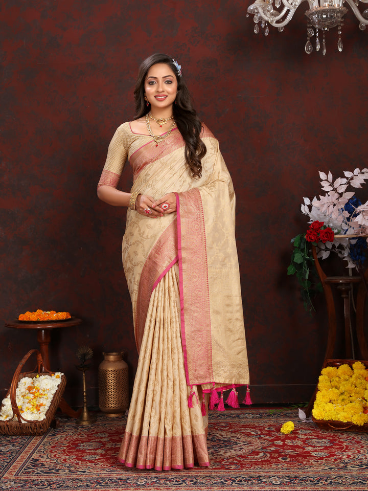 Elegant beige Katan silk saree with intricate zari weaving and blouse piece, perfect for special occasions.