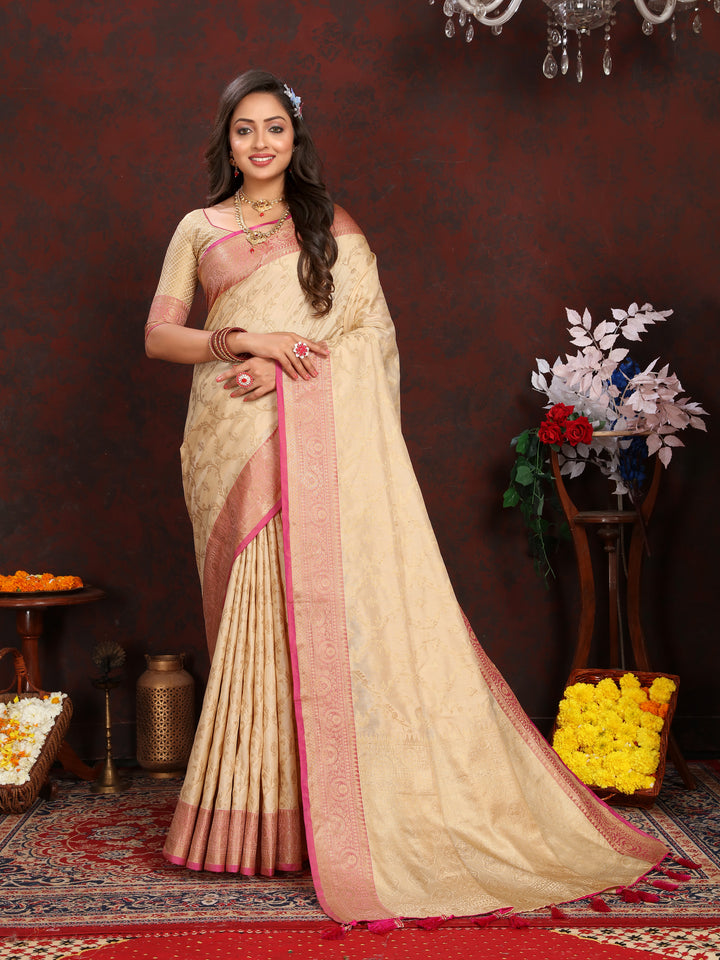 Timeless beige soft Katan silk saree featuring exquisite zari work, ideal for traditional celebrations.