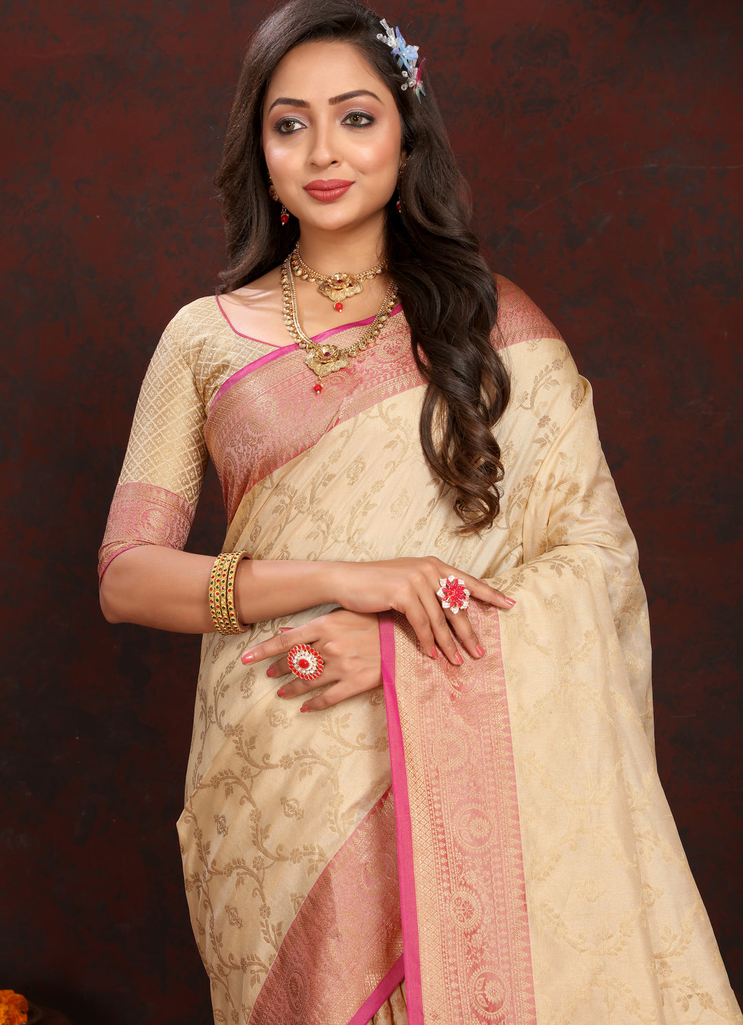 Beautiful beige Katan silk saree with rich zari weaving, complete with a matching blouse piece.