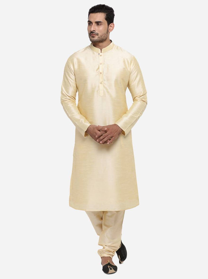 Elevate your ethnic style with this Solid Light Golden Kurta Set.