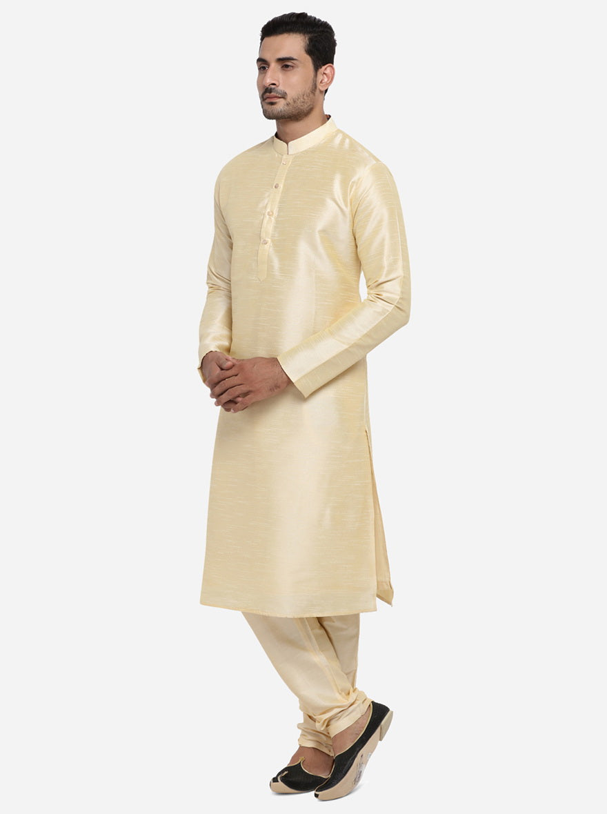 Comfortable light golden kurta pajama combining style and comfort.