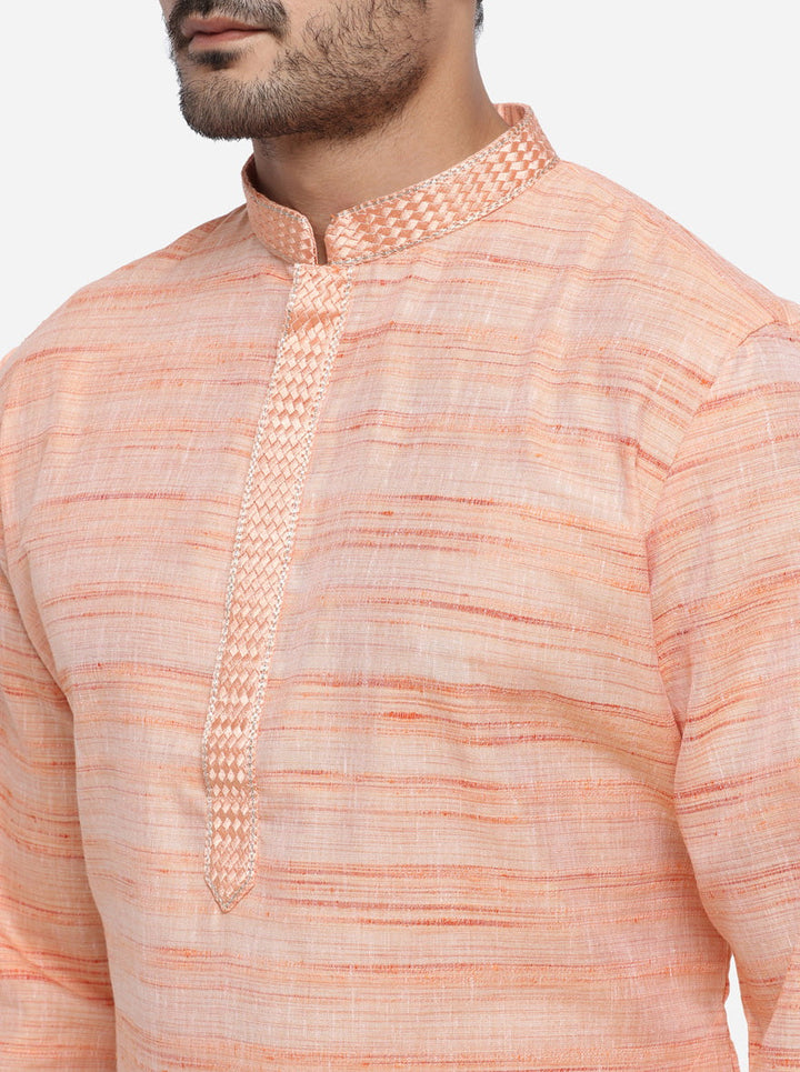 Elegant peach kurta set, ideal for enhancing your ethnic wardrobe.