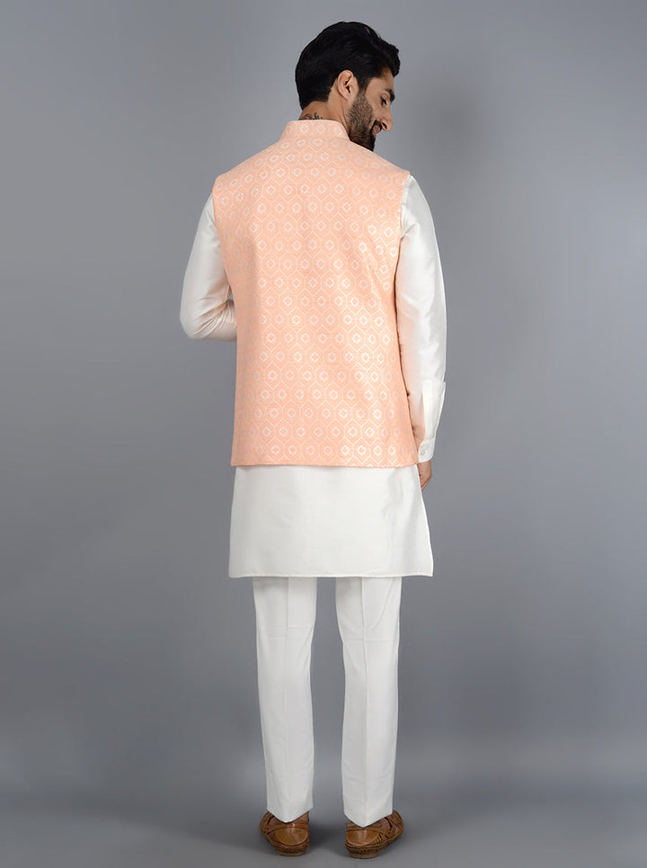 Make a statement with this peach bandhgala jacket, crafted from jacquard fabric with self-design, ideal for weddings and festive events.