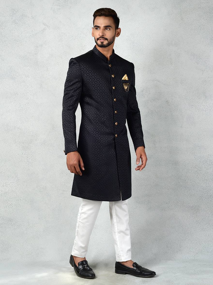 Elegant black Indo-Western kurta for men with jacquard pattern and golden details.