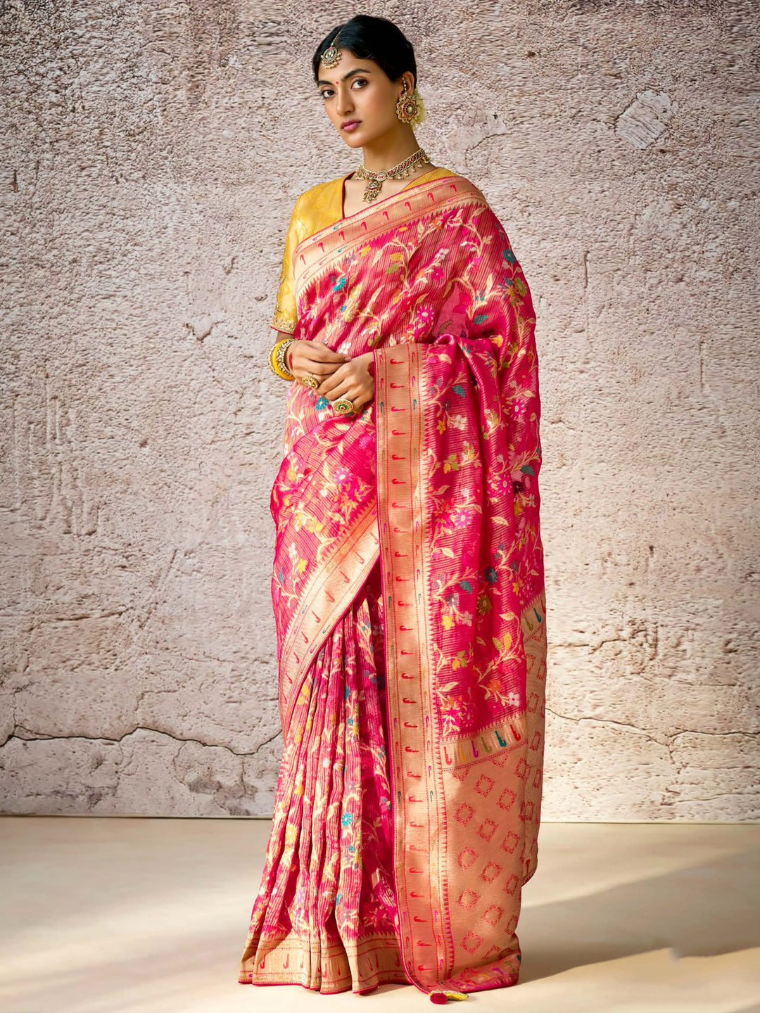 Pink silk saree crafted for elegance and style.