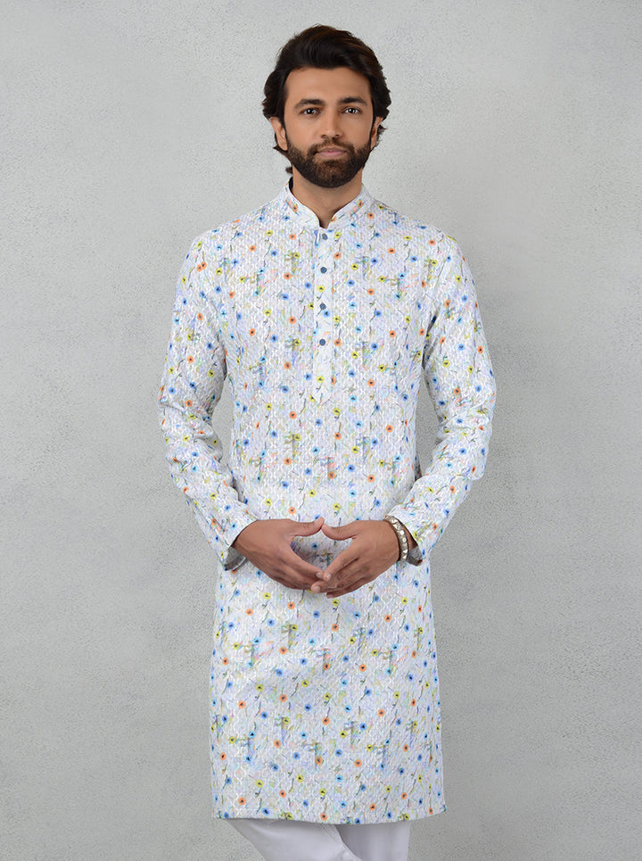 This casual white and blue kurta pajama exudes traditional charm while honoring modern styles for men.