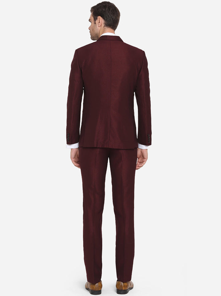 Luxurious maroon men's suit, ideal for elevating your style at weddings and prom with its sleek and fashionable design.