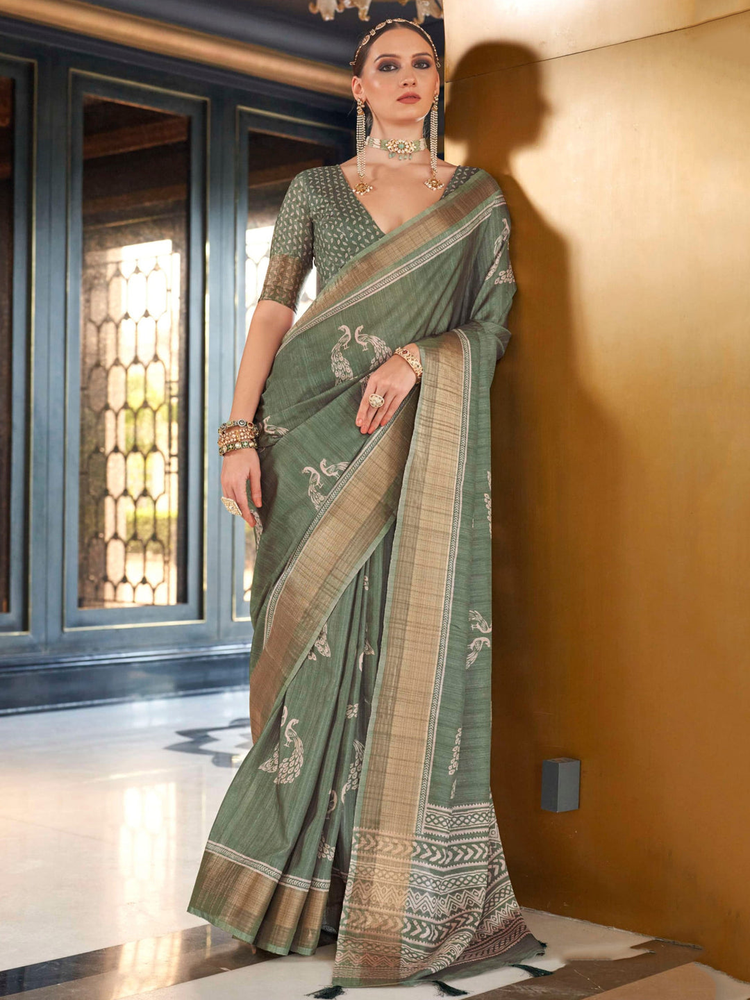 Green silk saree crafted for elegance and style.