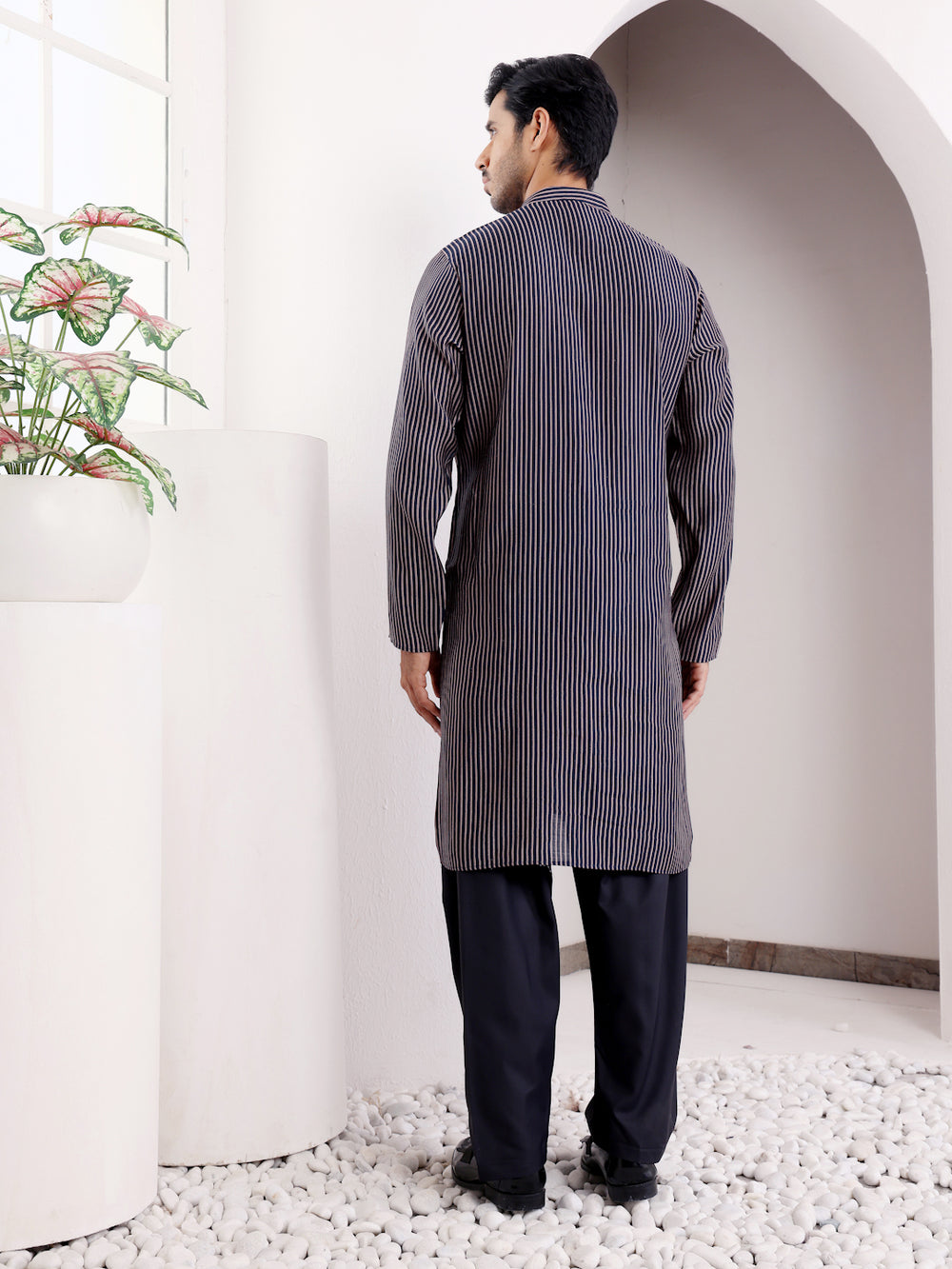 Men's navy blue embroidered kurta pajama set for festive wear
