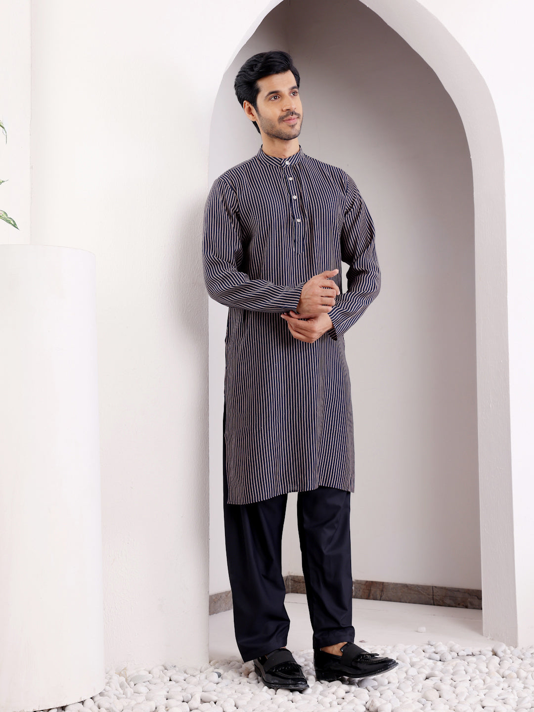 Navy blue modal silk kurta set with intricate embroidery for men
