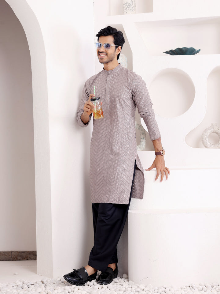 Elegant dark grey Viscose kurta for men with exquisite handwoven motifs and Chikankari detailing.