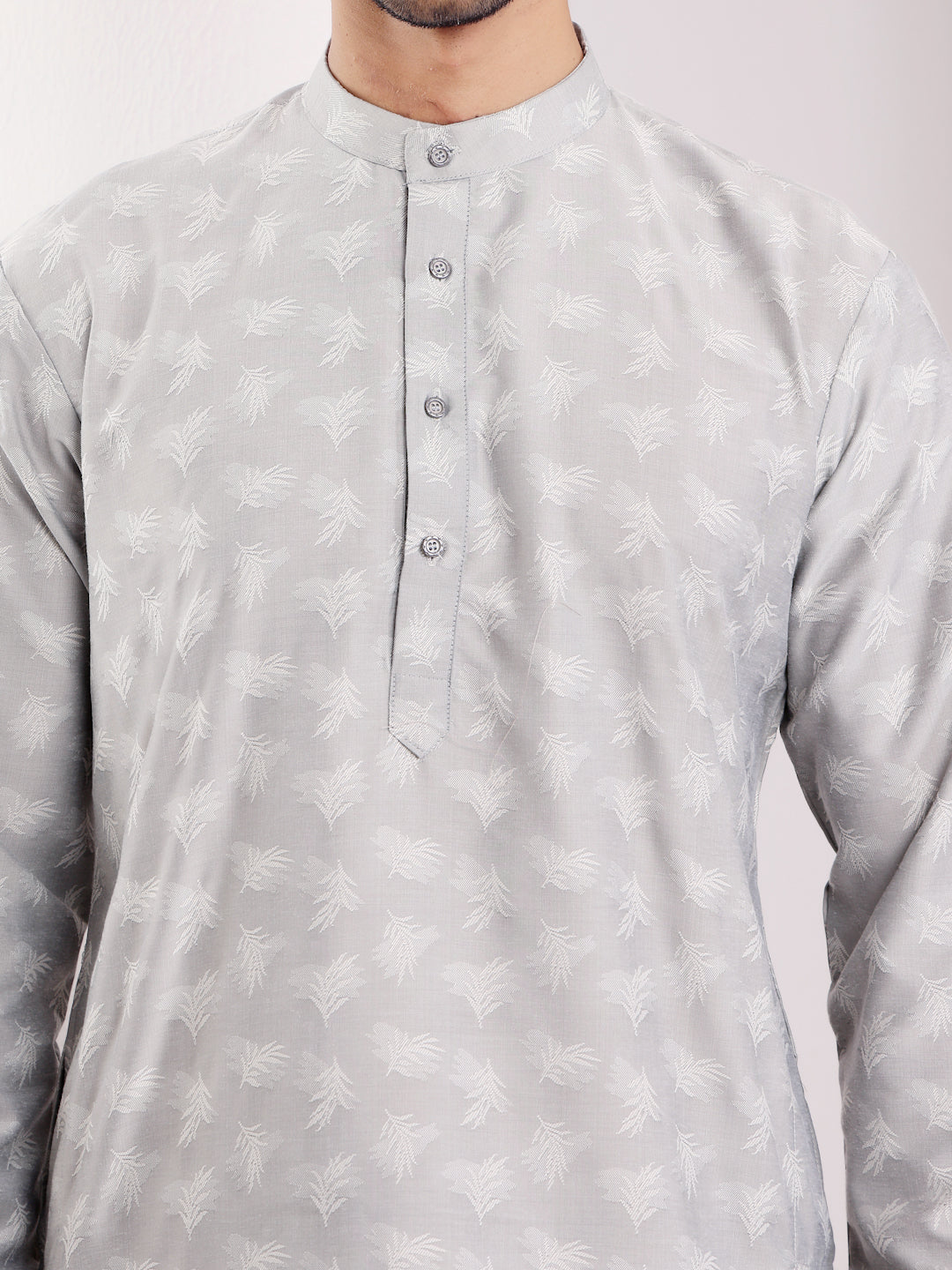 Gray designer kurta with handwoven motifs, offering timeless style and comfort for any occasion.