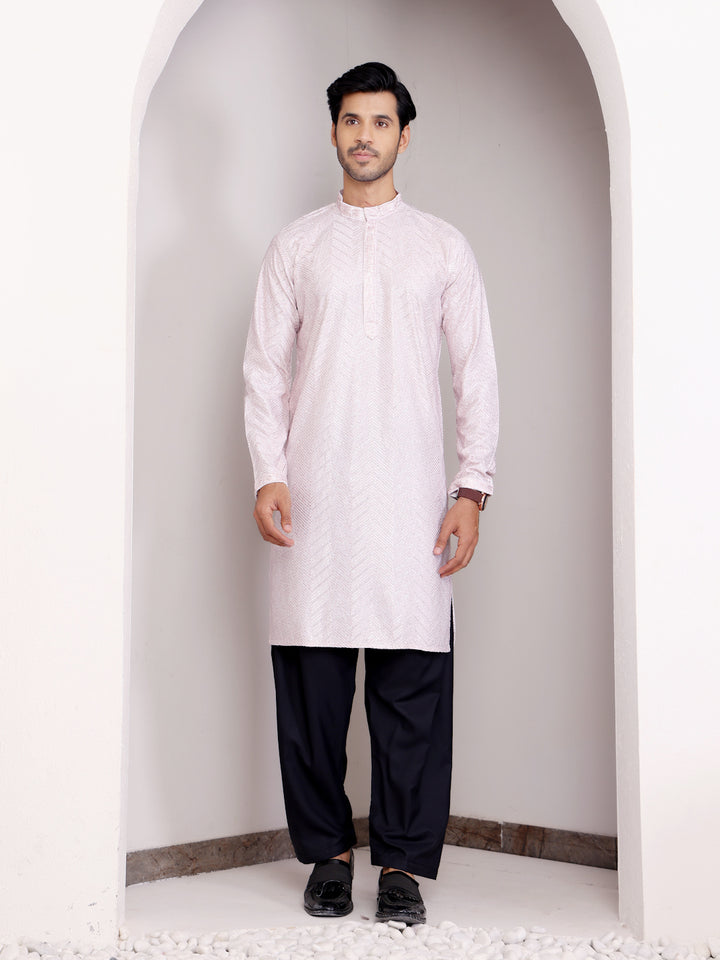 Elegant light pink Viscose kurta set with Chikankari work and handwoven details, ideal for festivals.