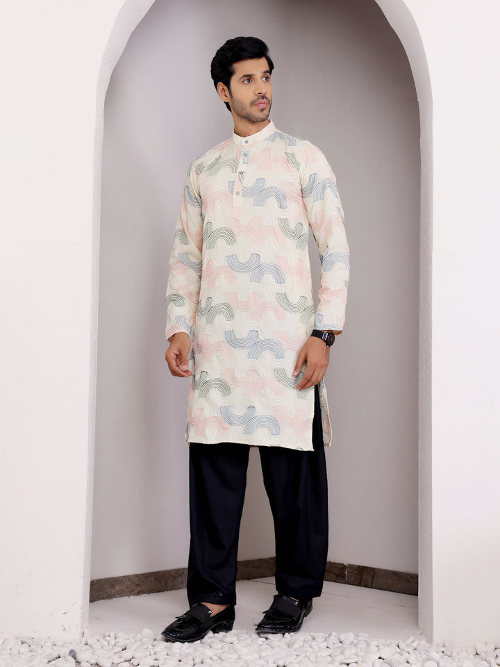 Elegant men's kurta with handwoven motifs for festivals and sangeet.