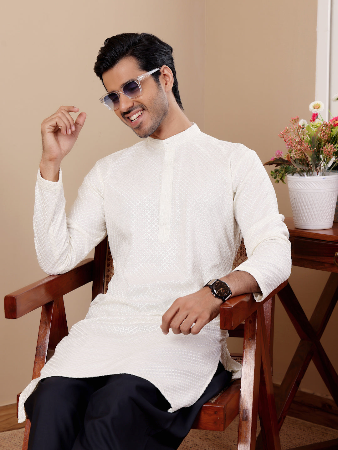 Stylish white Viscose kurta set for men, showcasing fine Chikankari work and elegant handwoven motifs.