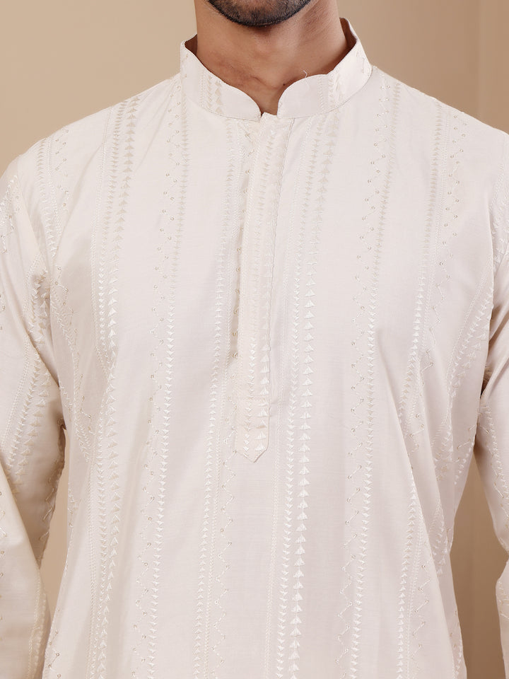 Breathable off-white kurta set for men crafted from premium cotton fabric for comfort.