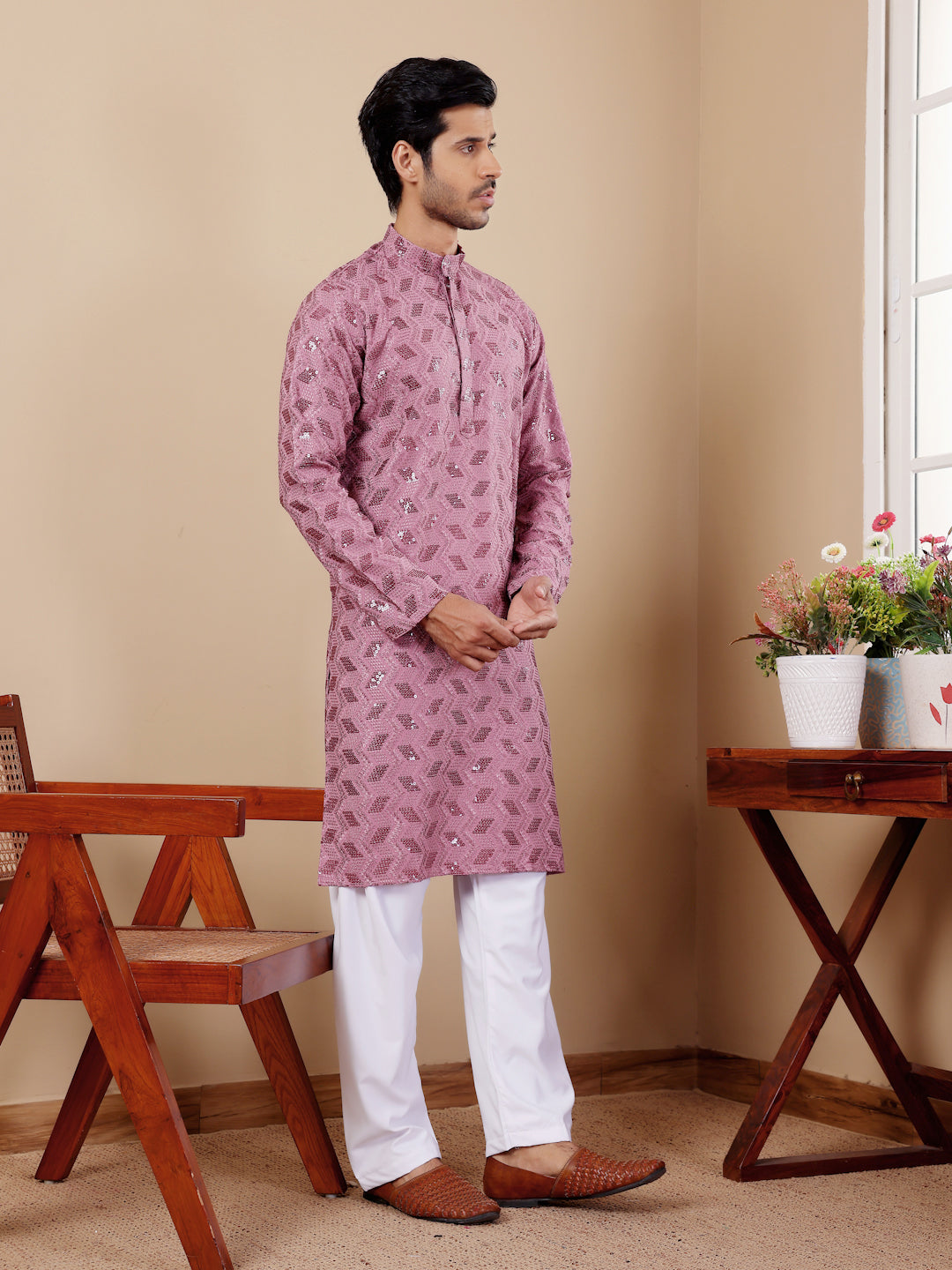 Pinkish purple kurta pajama for men, perfect for party wear, with Chikankari embroidery.