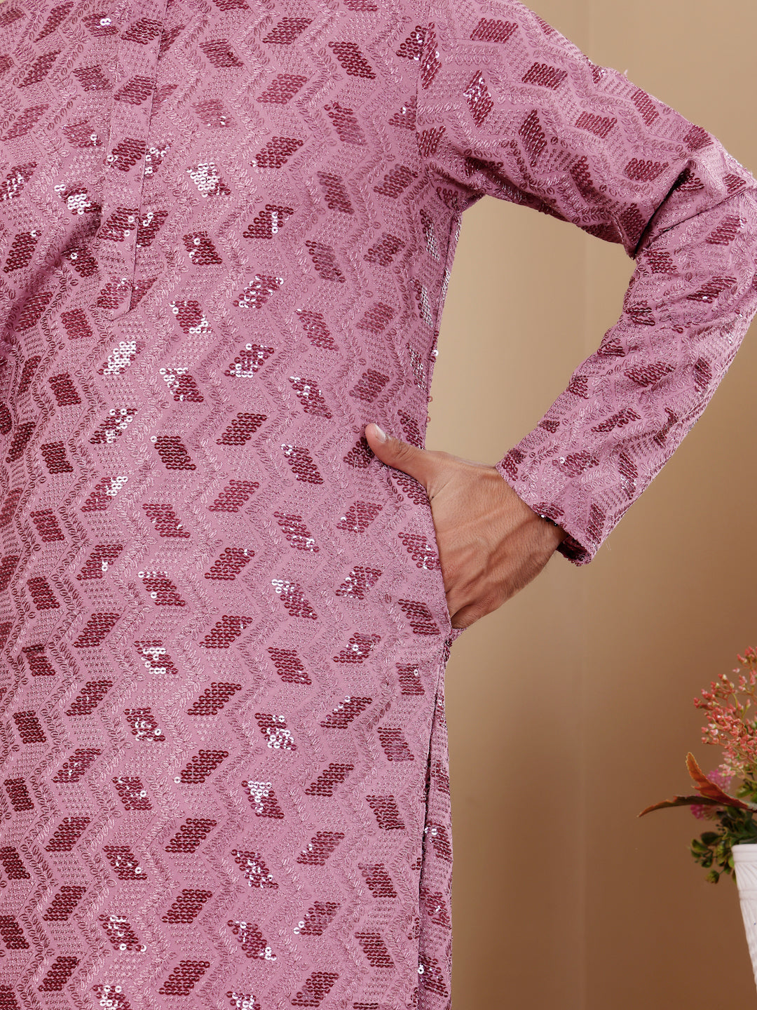 Pinkish purple kurta pajama for men with Chikankari embroidery and luxurious art silk.