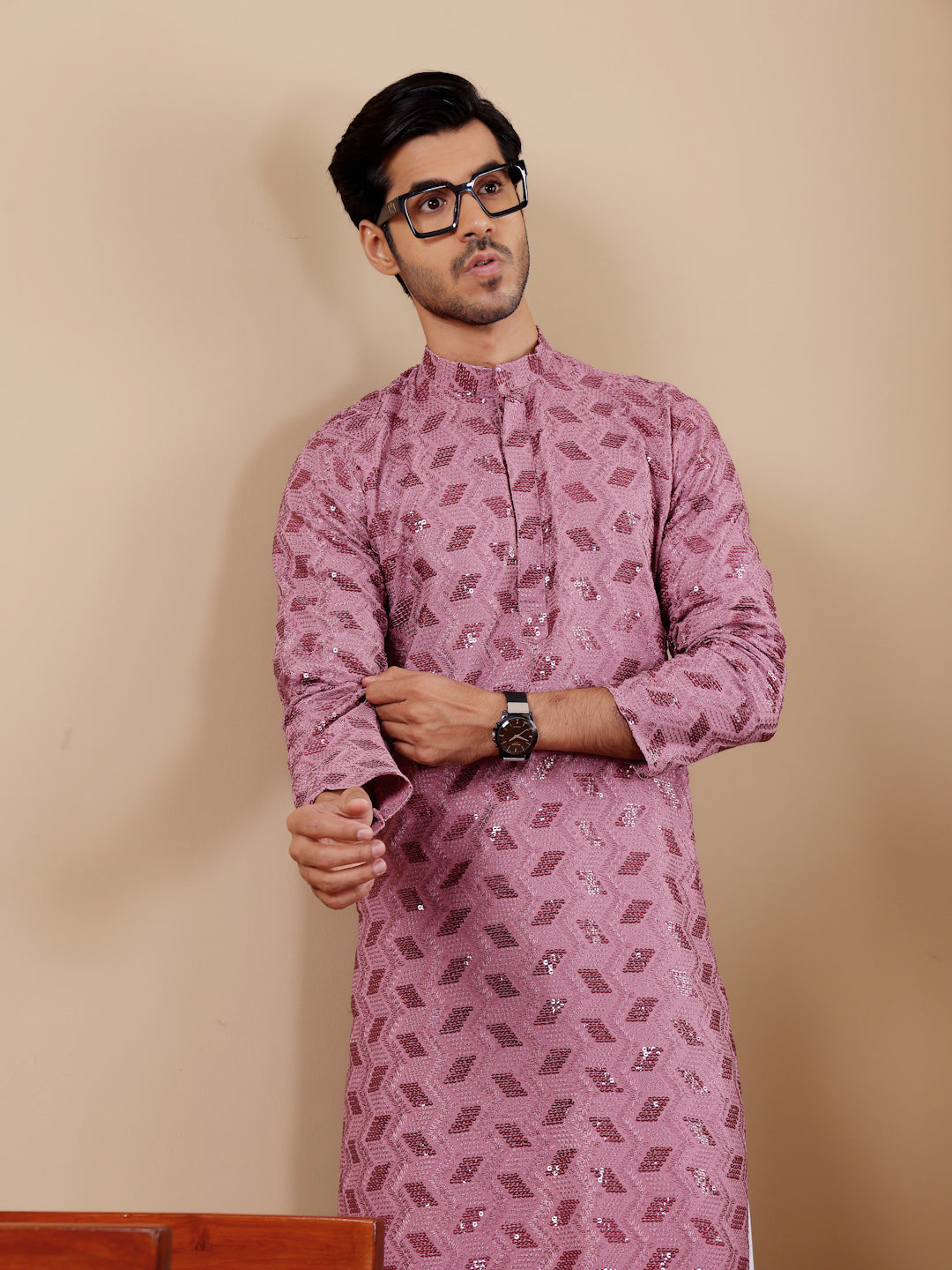 Traditional pinkish purple kurta pajama with delicate Chikankari embroidery for festive occasions.