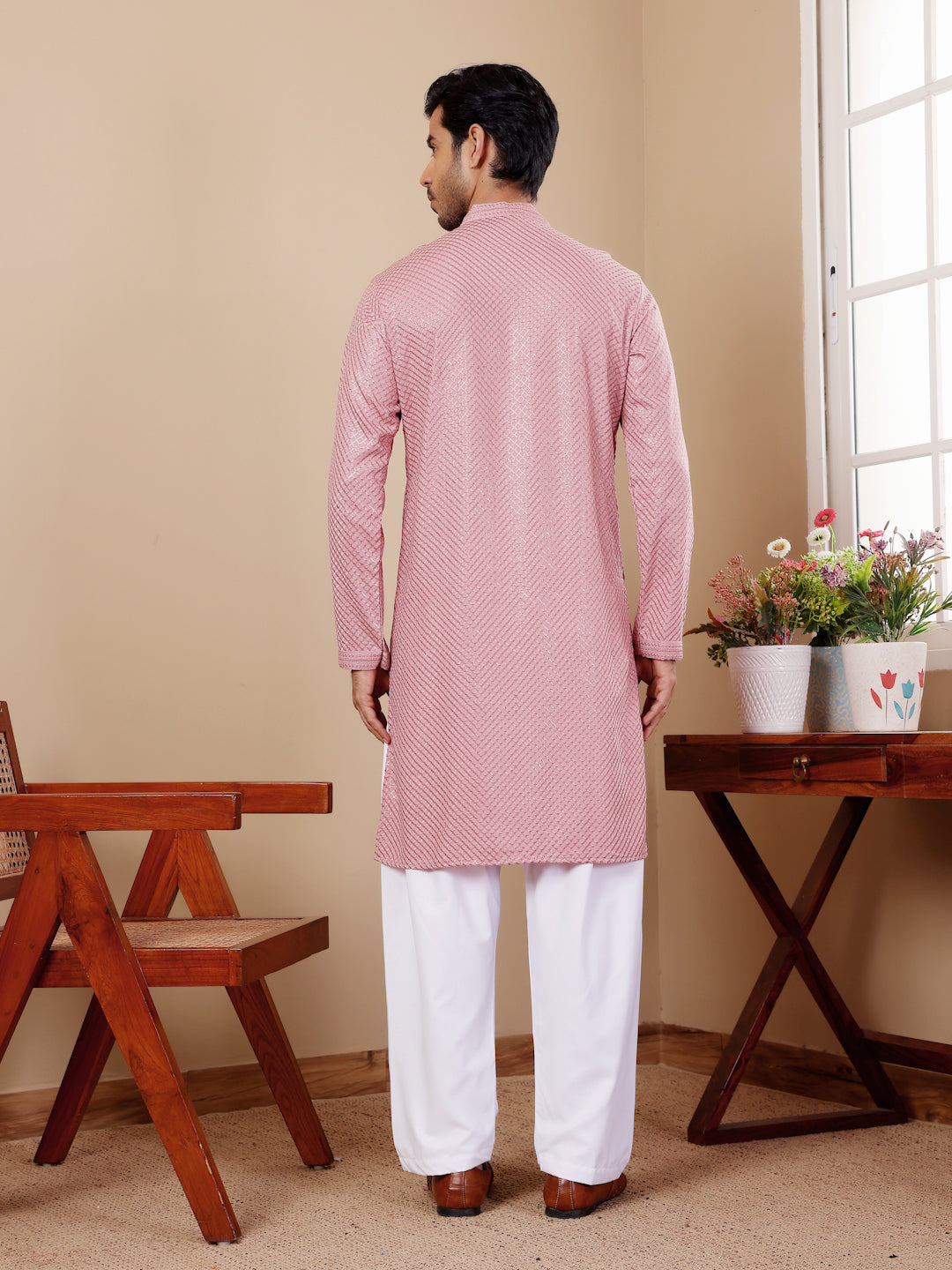 Onion pink kurta set for men with Chikankari embroidery and stylish art silk bottoms.