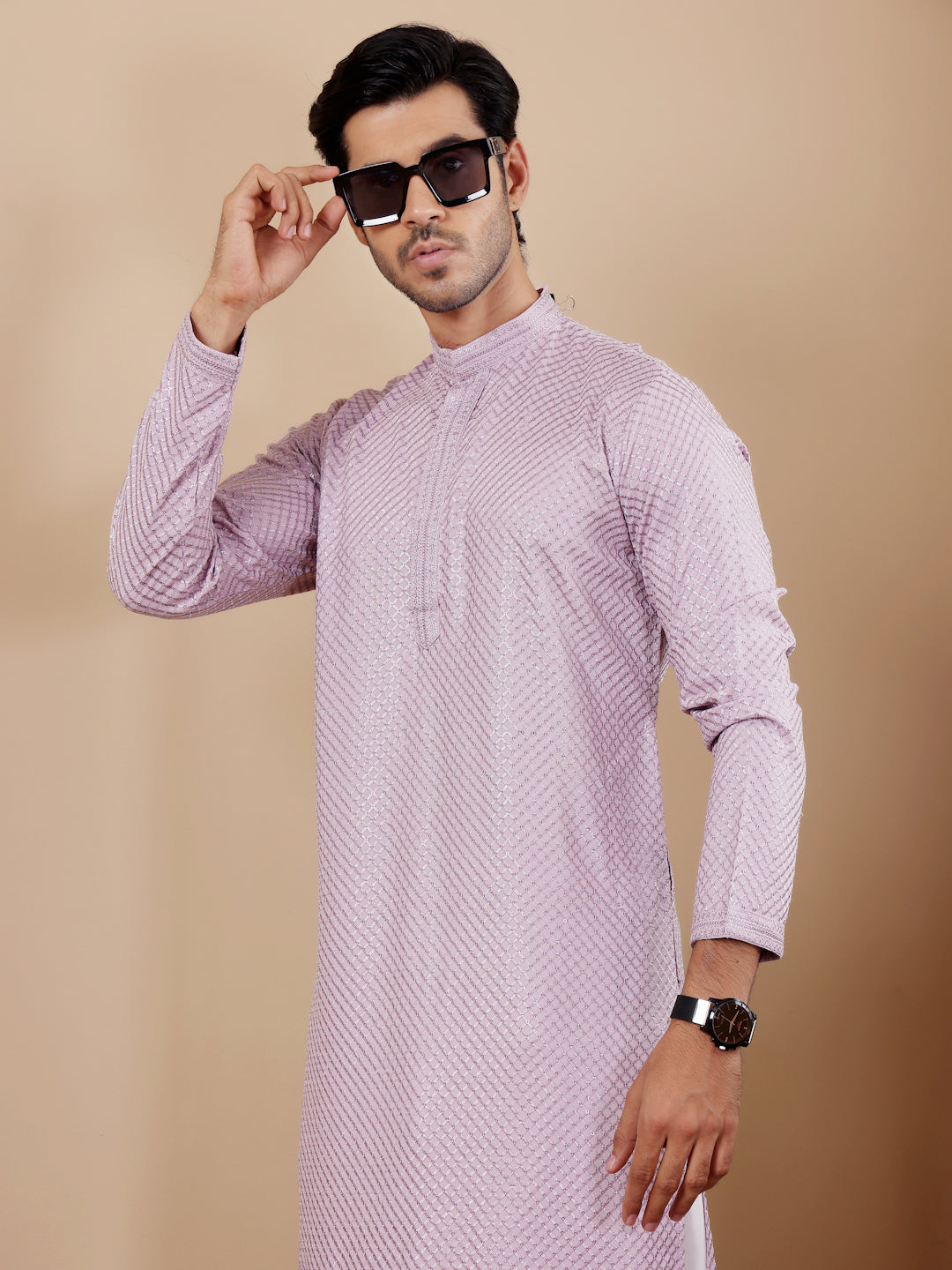 Elegant lavender kurta set for men with beautiful Chikankari embroidery and comfortable art silk bottoms.