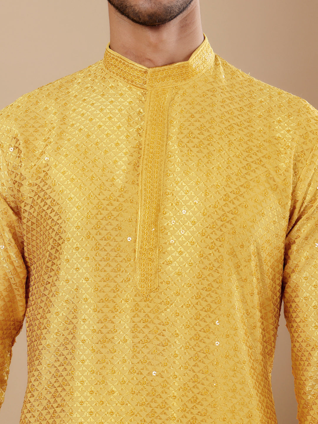 Comfortable yellow kurta for men with exquisite Chikankari embroidery.