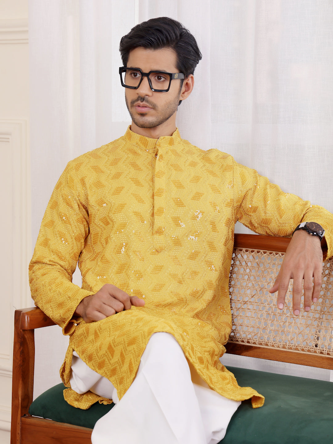 Vibrant yellow kurta with floral Chikankari work and luxurious art silk bottoms for men.