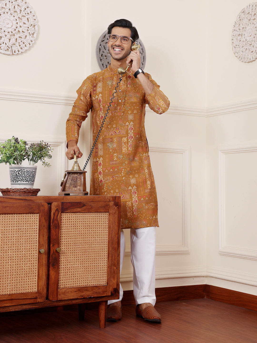 Brownish yellow kurta set for men, featuring fine embroidery and silk fabric.
