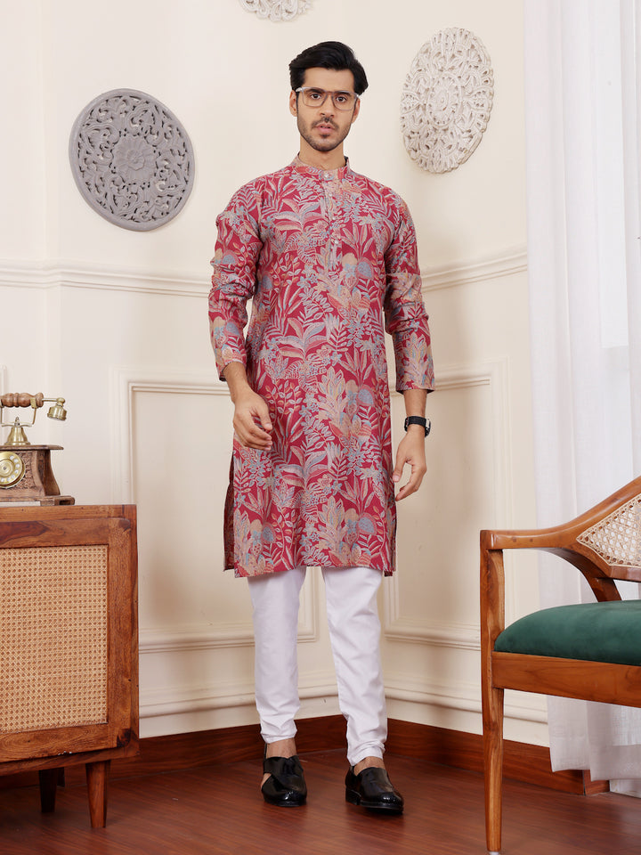 Traditional men’s kurta set in pink with beautiful embroidered motifs
