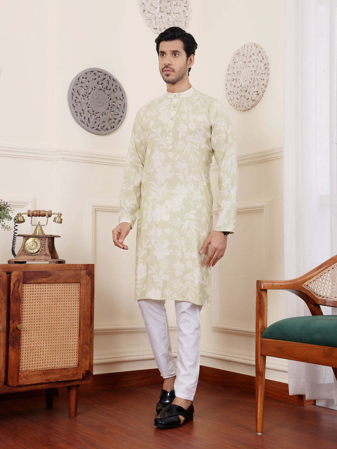 Traditional light green embroidered kurta pajama set for weddings